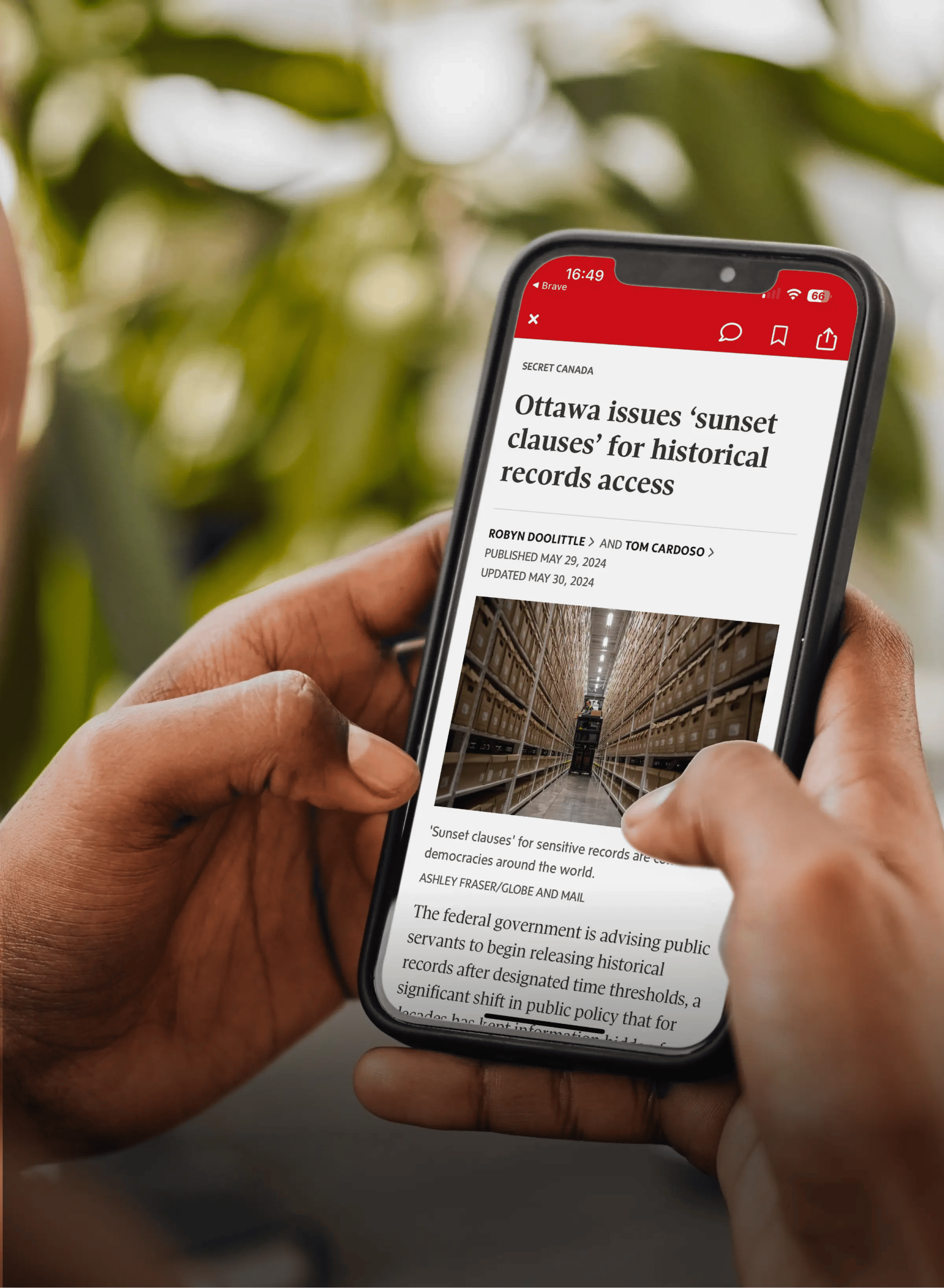 A person reading a news article on a phone