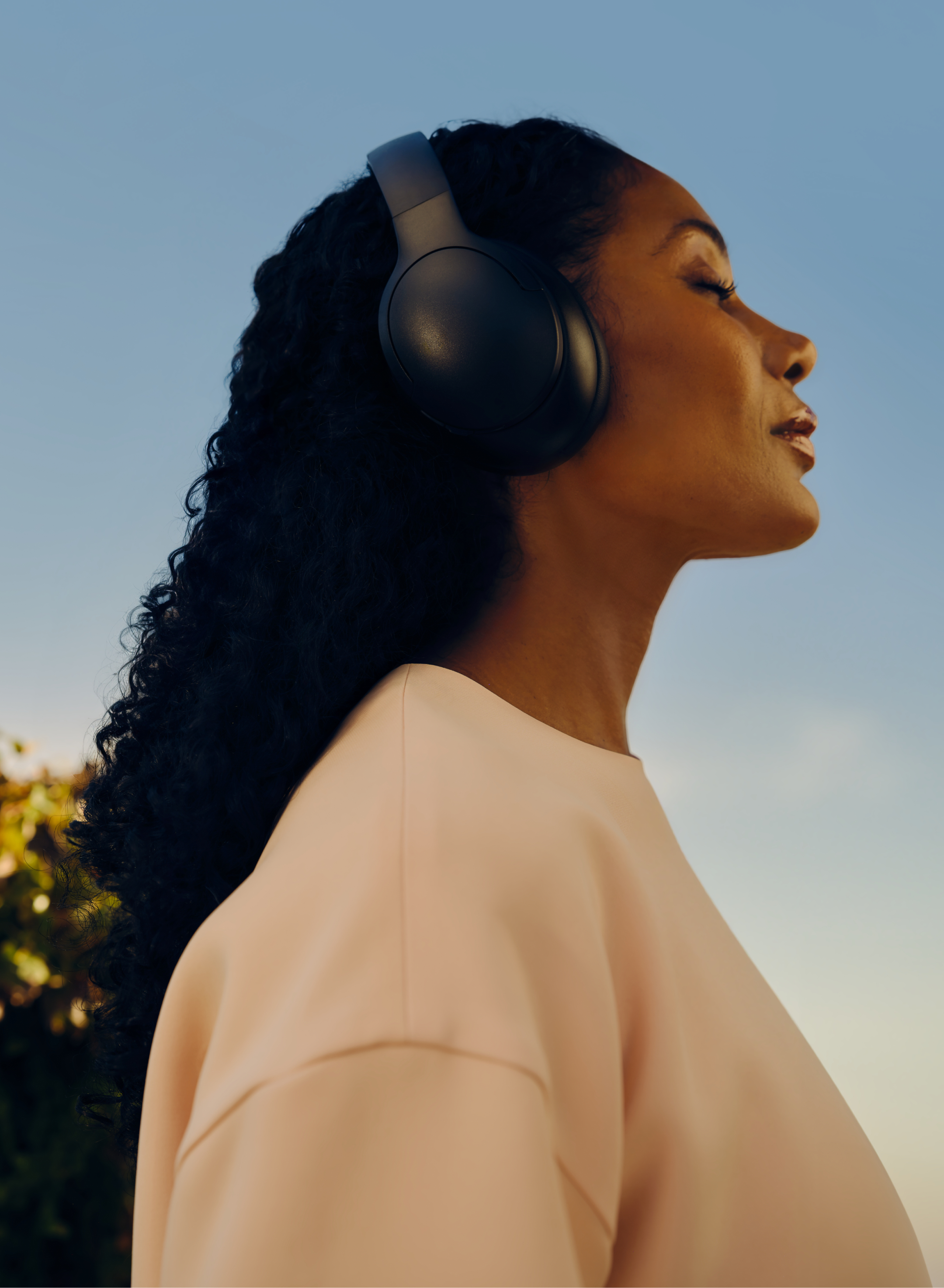 A woman wearing headphones