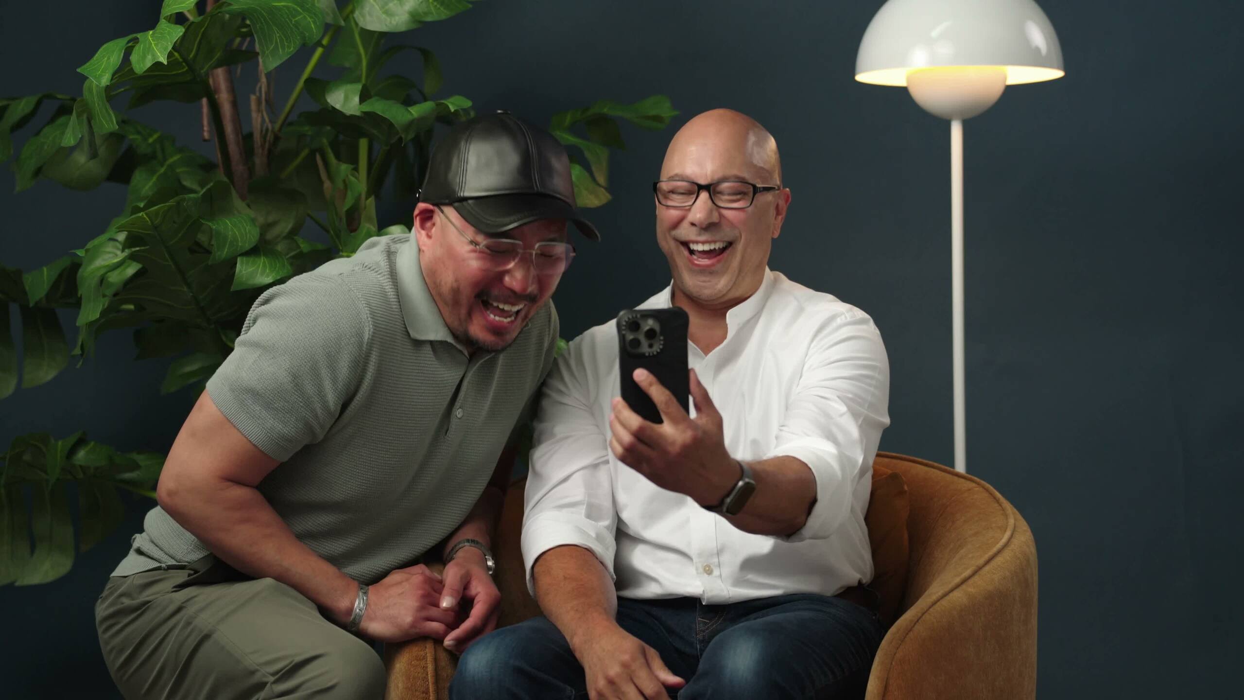Our million dollar winner, David is with his husband, Paul. They're both laughing, because David is FaceTiming his sister.