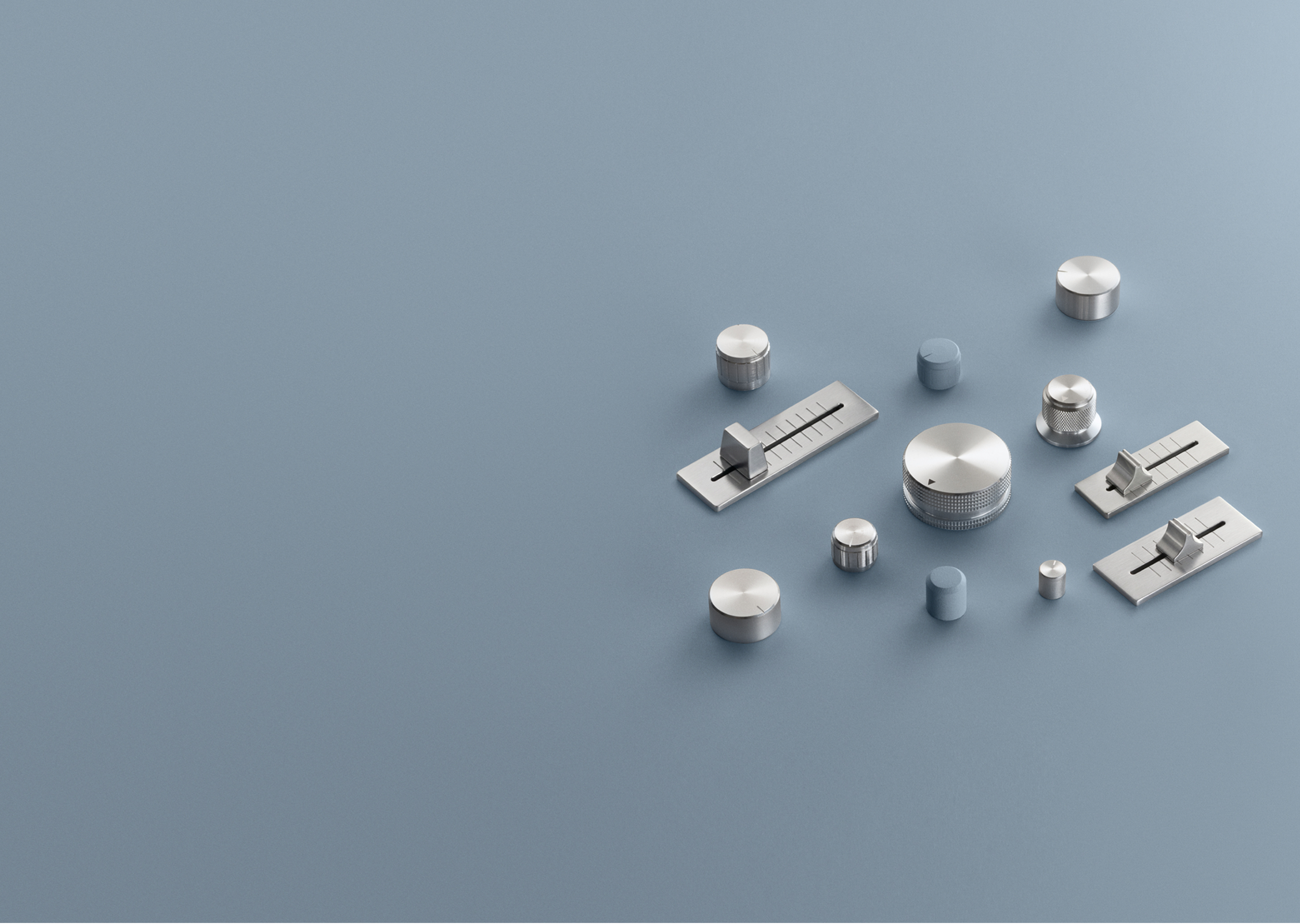 A series of metal knobs and sliders.